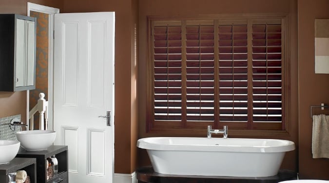 Painted bathrooms with timberland shutters